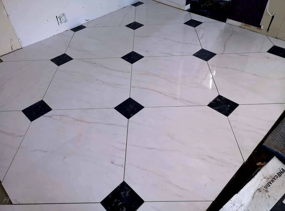 30 x 30 porcelain floor installation with insert (pre-cut by us)
